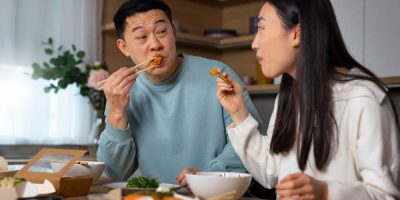A couple eating food